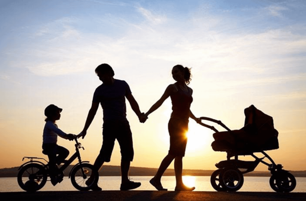 family going for walk with pram
